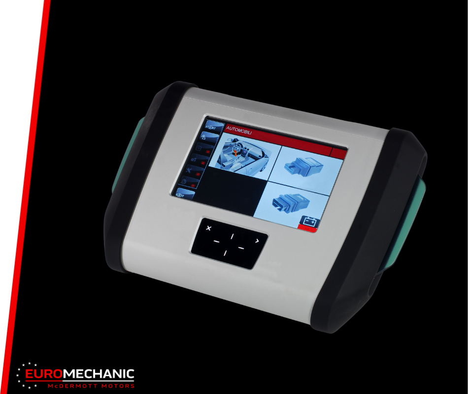 A handheld automotive diagnostic device with a color touchscreen displaying mechanical diagrams, perfect for car checkups in Toronto. The device features a simple control pad below the screen, and the brand name EUROMECHANIC with logo is in the bottom left corner. EuroMechanic | McDermott Motors Auto | Top Reviewed Auto Repair Shop in Toronto | Visit mcdermottmotors.com