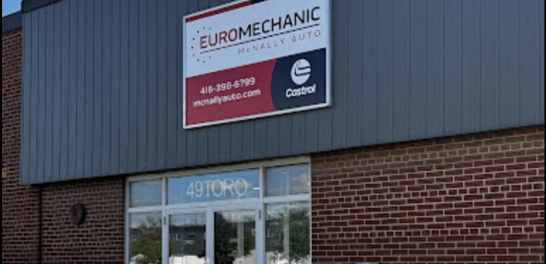 Brick and metal facade of a building with a sign reading Euromechanic McNally Auto and the Castrol logo. The entrance below displays the address 49 Toro. EuroMechanic | McDermott Motors Auto | Top Reviewed Auto Repair Shop in Toronto | Visit mcdermottmotors.com