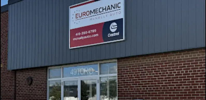 Brick and metal facade of a building with a sign reading Euromechanic McNally Auto and the Castrol logo. The entrance below displays the address 49 Toro. EuroMechanic | McDermott Motors Auto | Top Reviewed Auto Repair Shop in Toronto | Visit mcdermottmotors.com