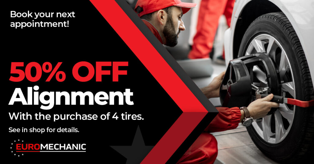 A mechanic in red uniform works on a car wheel. Text reads: 50% OFF Alignment with the purchase of 4 tires. EURO MECHANIC. Book your next appointment! See in shop for details. EuroMechanic - McDermott Motors | Top Reviewed Auto Repair Shop in Toronto | Visit EuroMechanic - McDermott Motors