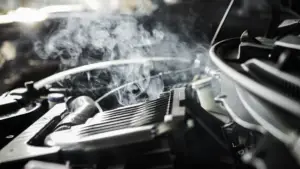 Car temperature gauge showing an overheating engine warning